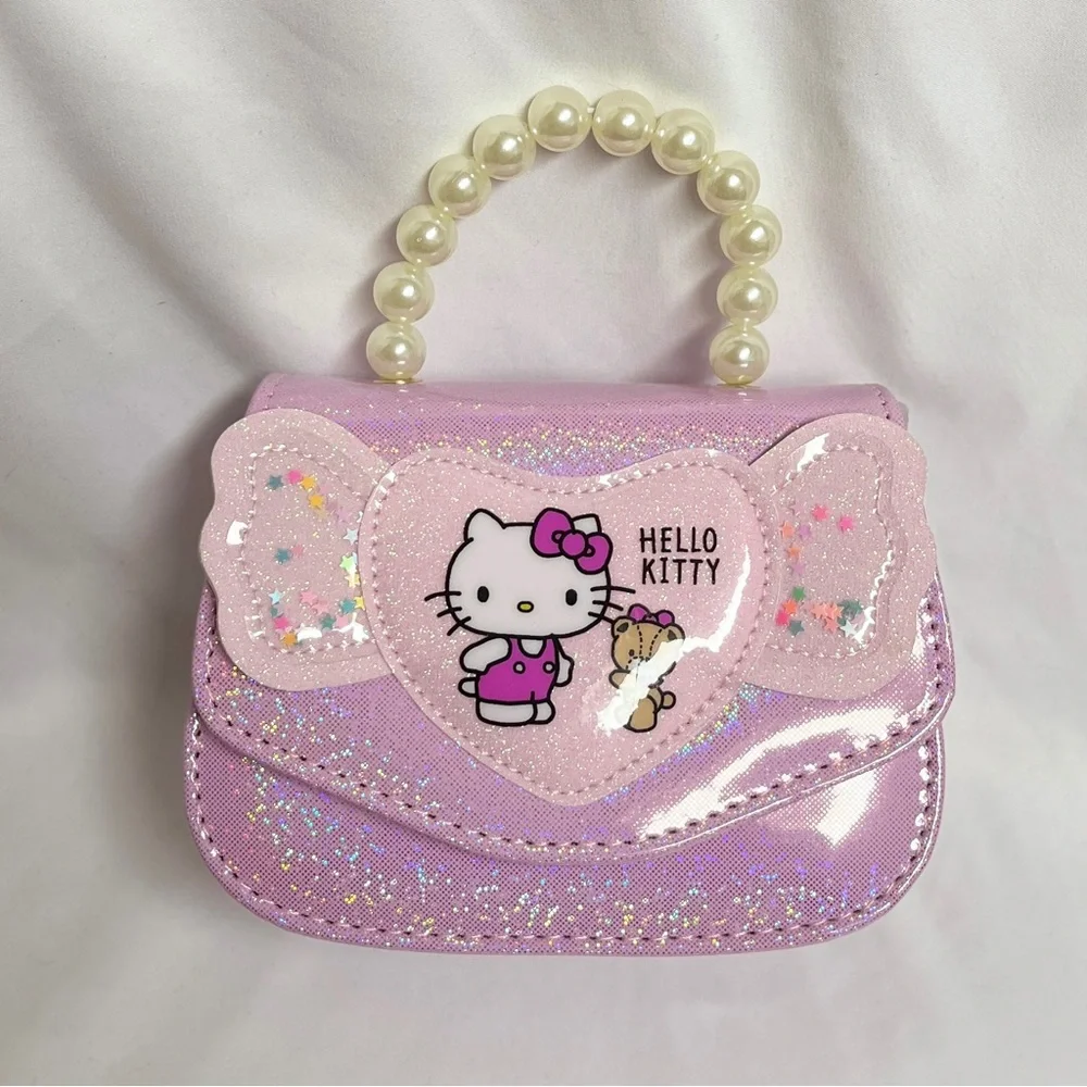 Hello Kitty Pink Glitter Purse, NIB, 6.5 x4.5”, crossbody strap incl, all ages